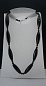 Бусы черный агат (р-р камня 40*12 мм, шар 5 мм), 54-62 см